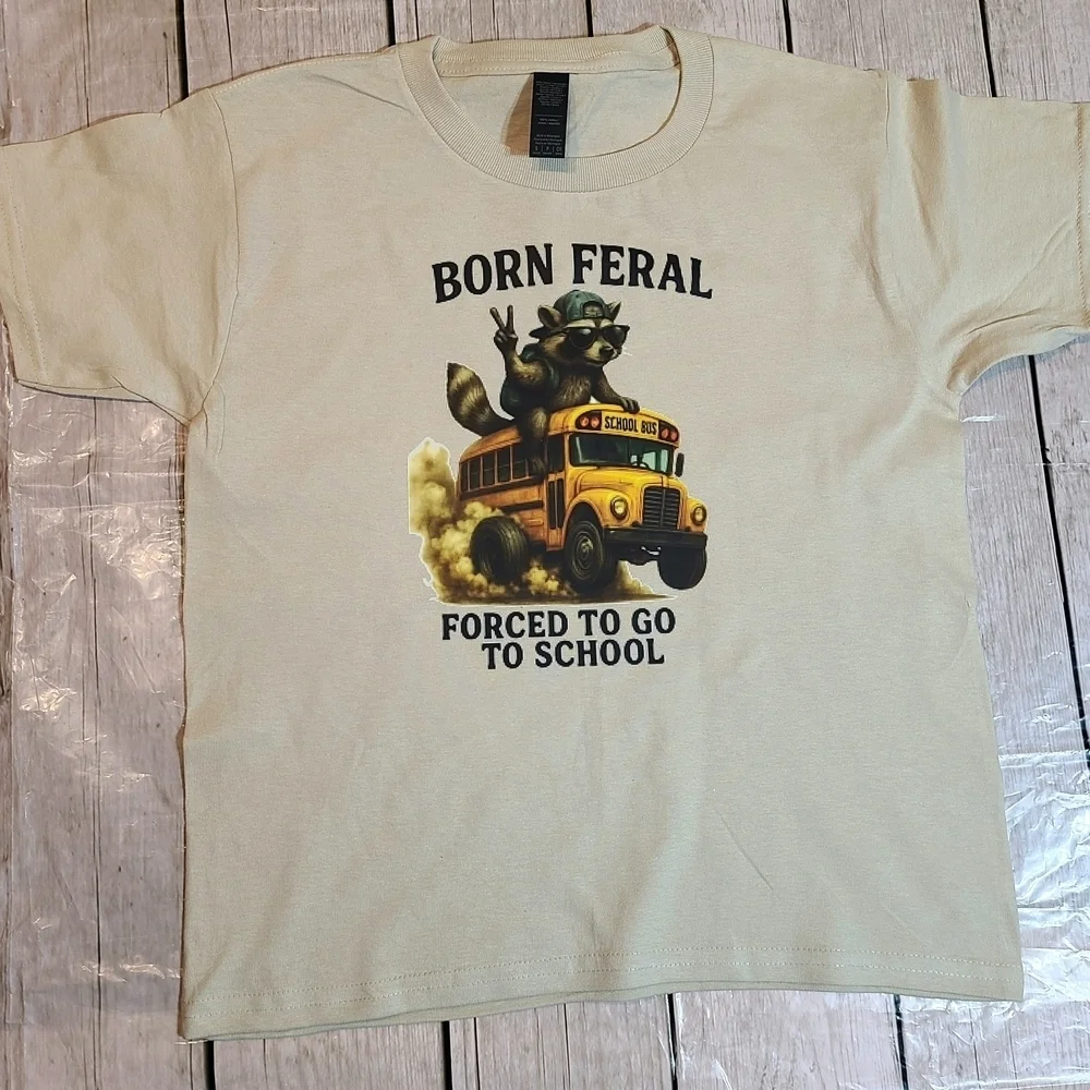 Kids Born Feral Graphic Tee with Raccoon and School Bus - cream